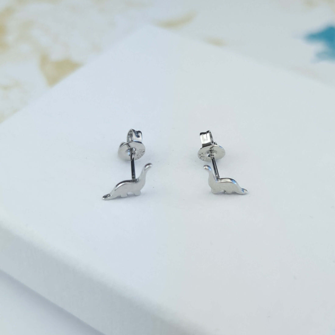dinosaur stud earrings in sterling silver