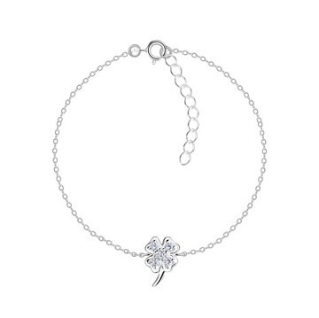 Sterling silver four-leaf clover bracelet with a sparkling centre on a fine adjustable chain, displayed on a white background.