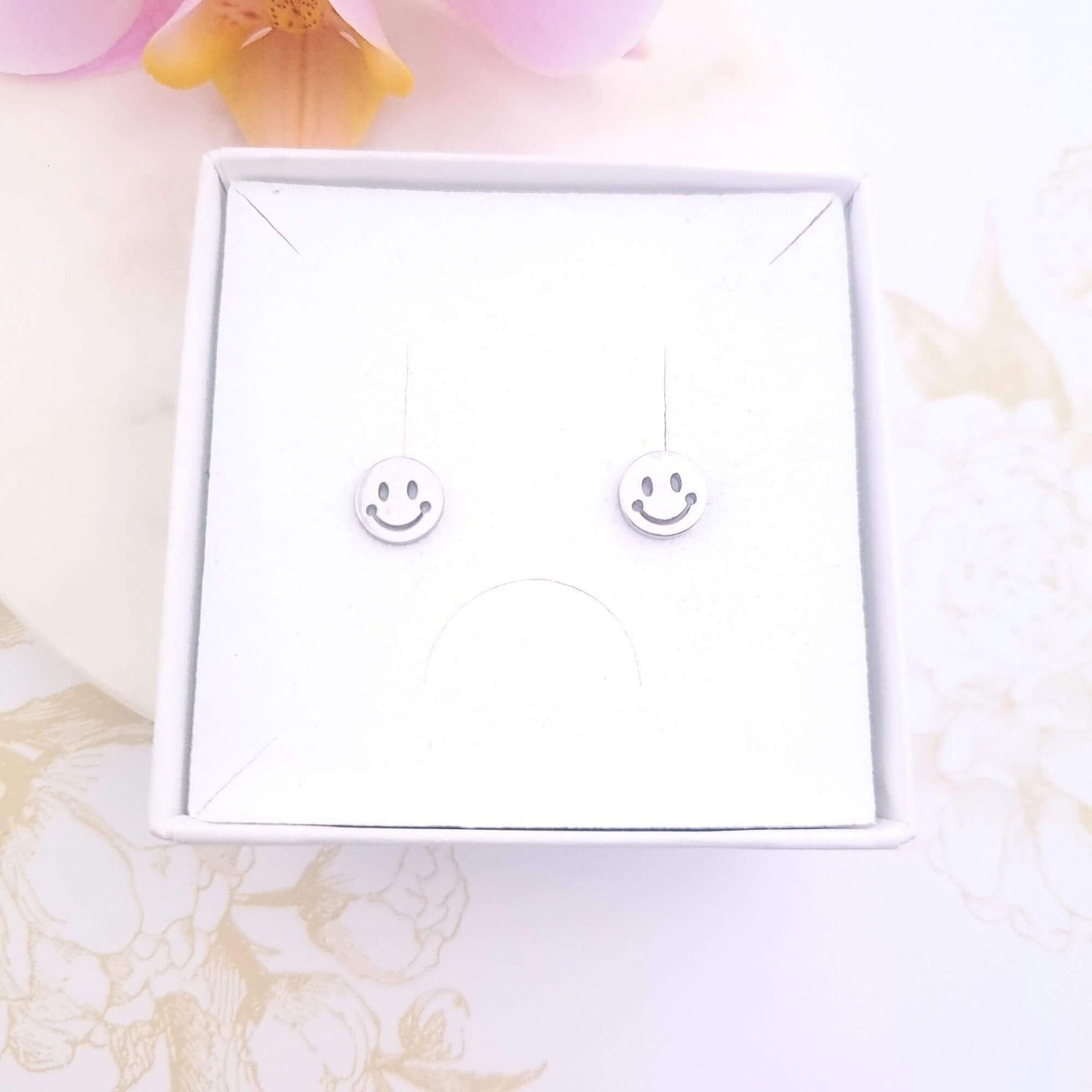 smiley face stud earrings silver in a gift box