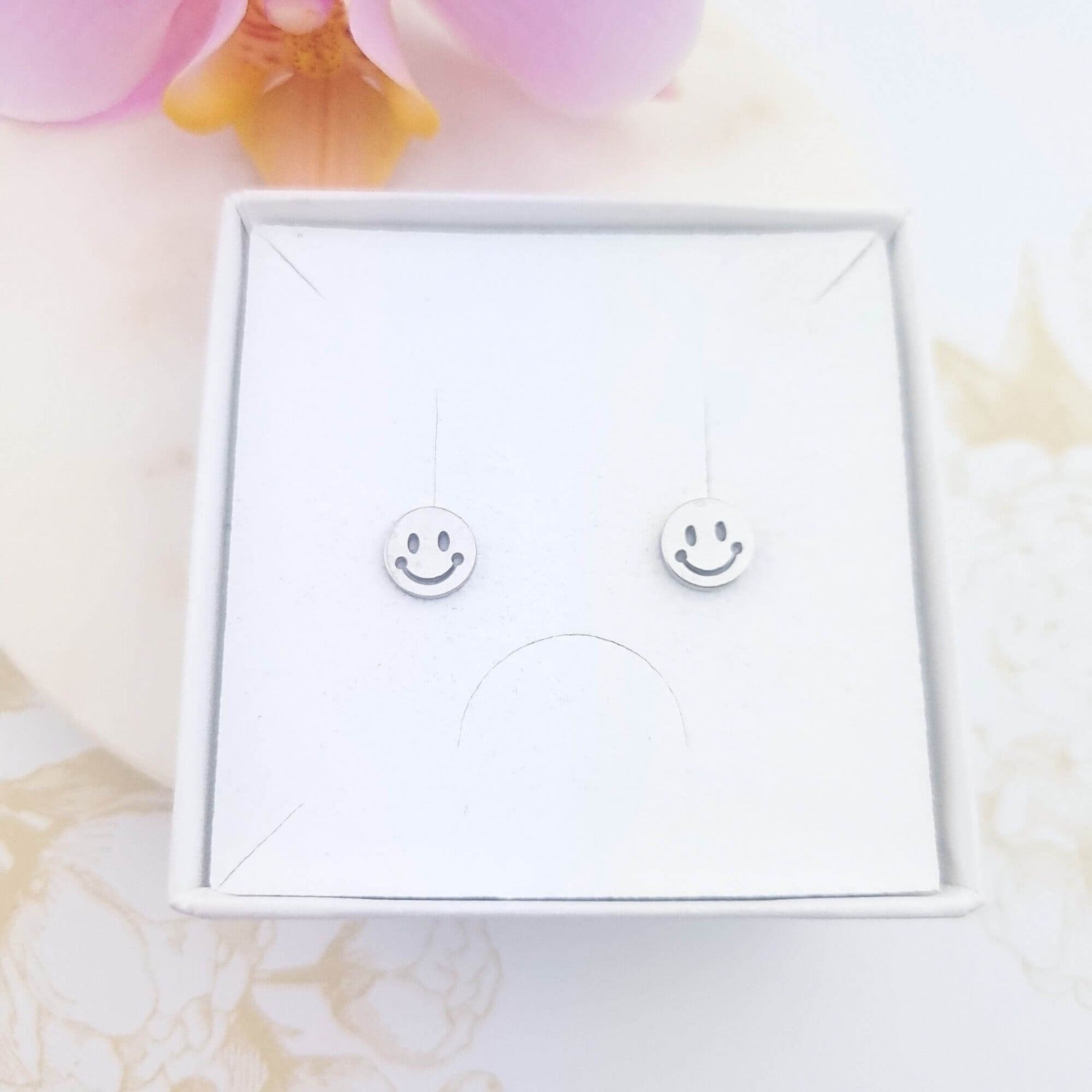 smiley face stud earrings
