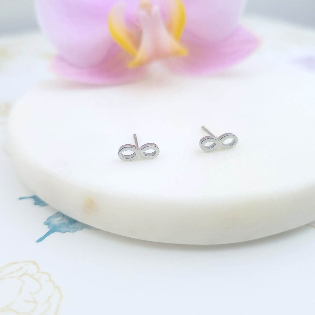 infinity symbol stud earrings silver