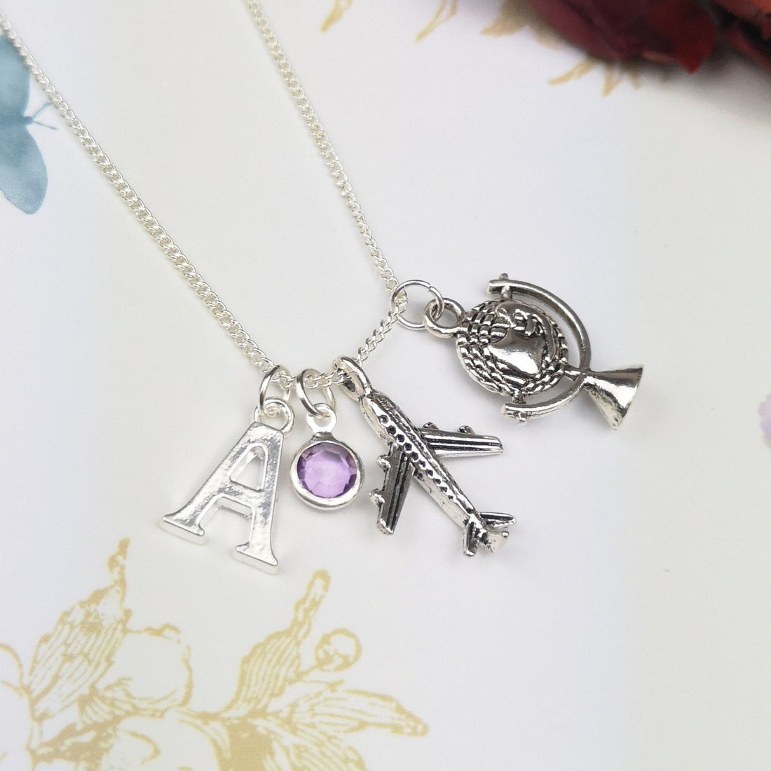 Personalised airplane necklace with initial and birthstone