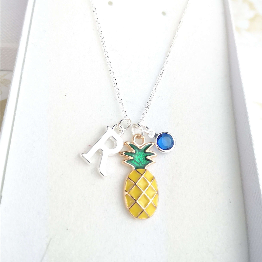 personalised pineapple necklace with initial and birthstone