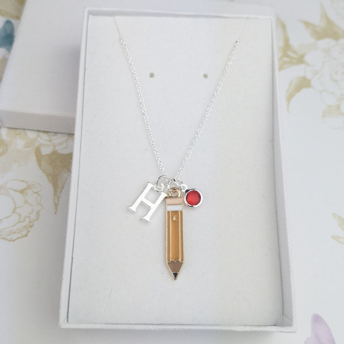 Personalised sterling silver necklace with an enamel pencil