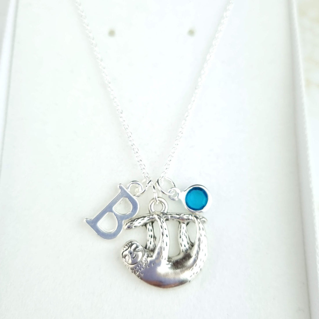 Sterling silver sloth necklace with initial and birthstone