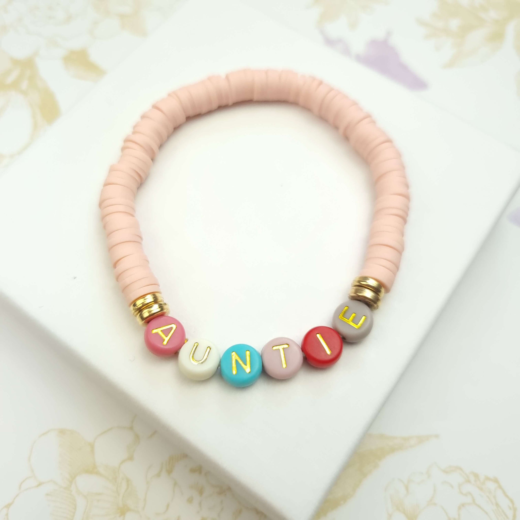 personalised beaded bracelet with the word auntie on it