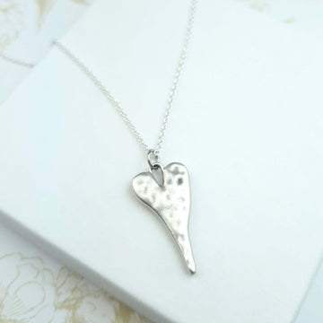 sterling silver necklace with hammered heart pendant