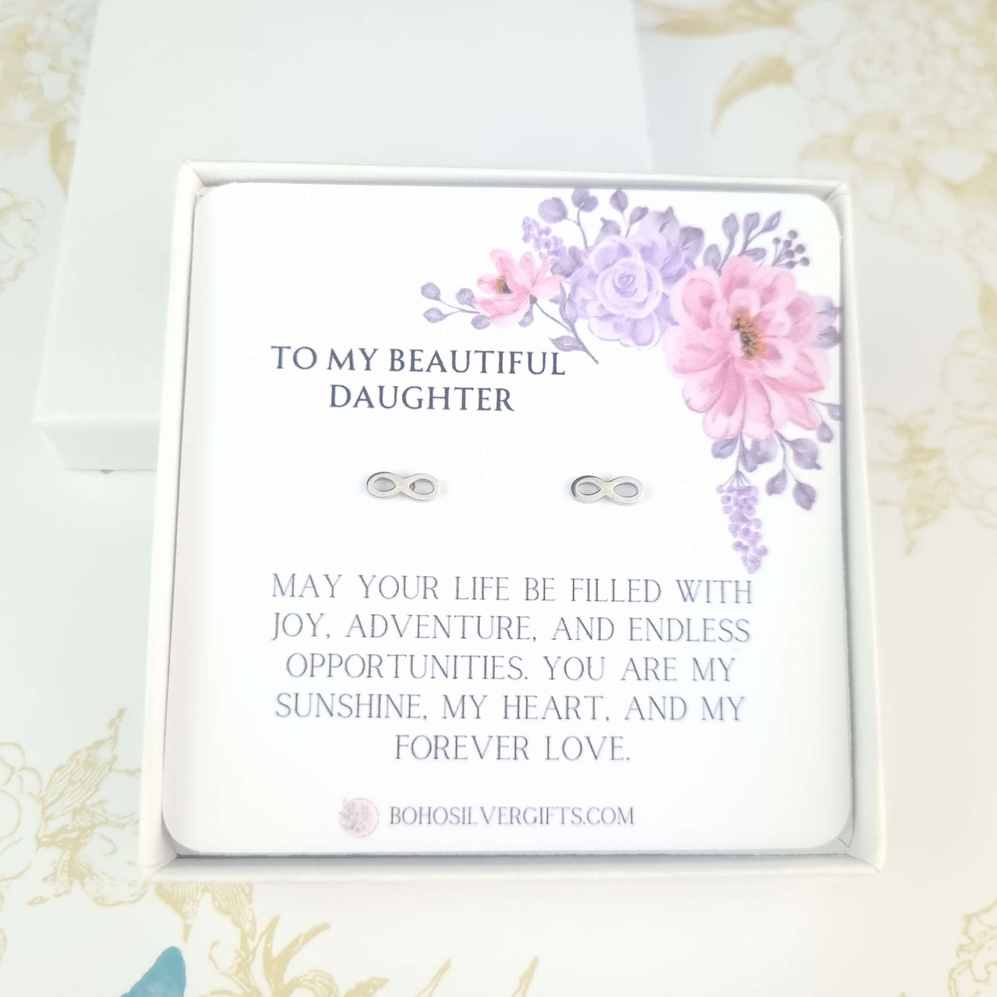 infinity earrings with a gift box and a back card with a lovely poem