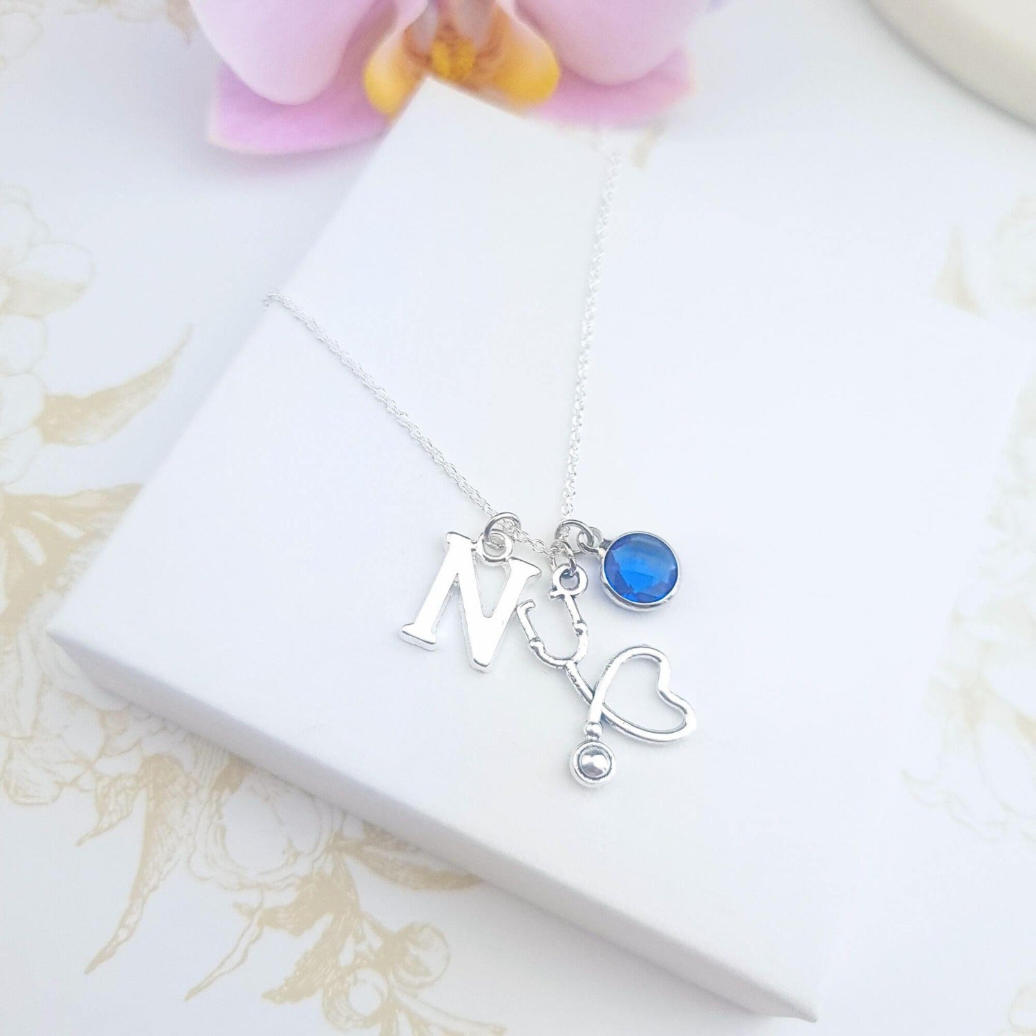 sterling silver personalised necklace with a stethoscope, initial & birthstone 
