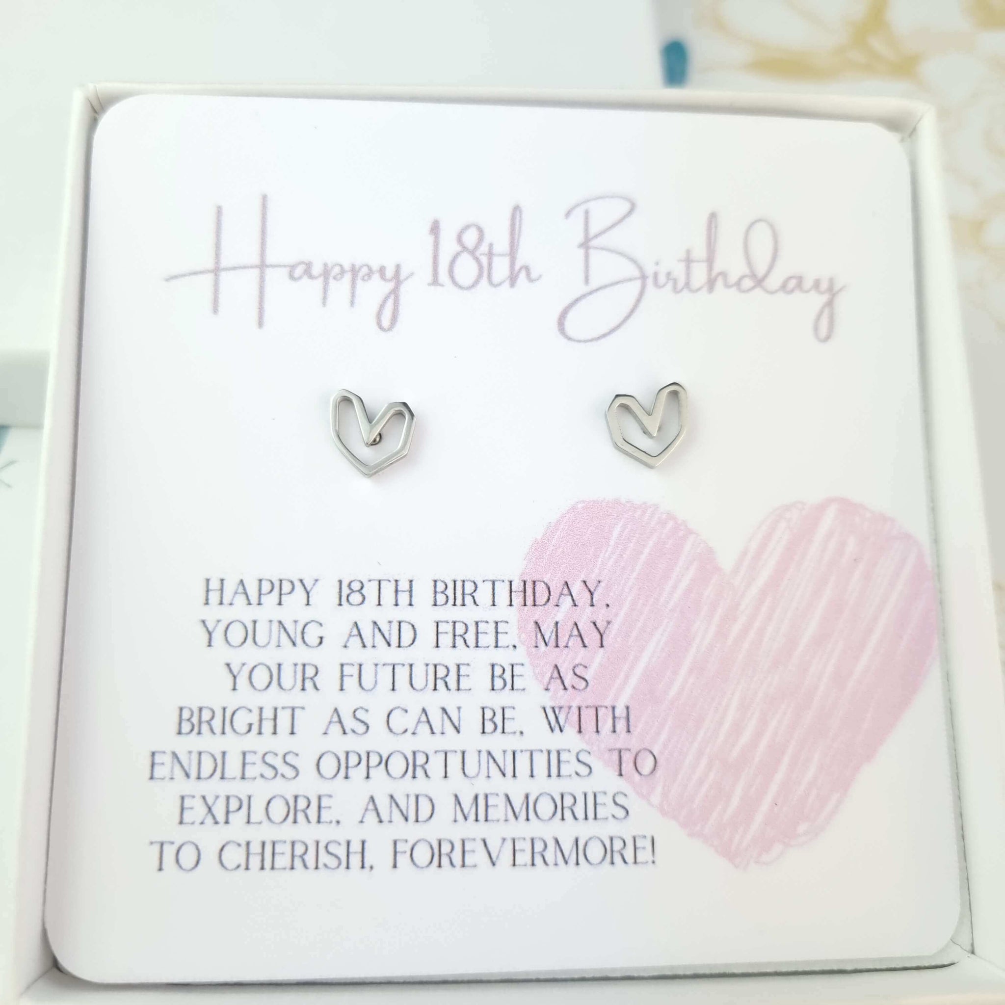 18th birthday gift with heart stud earrings inside a gift box with card