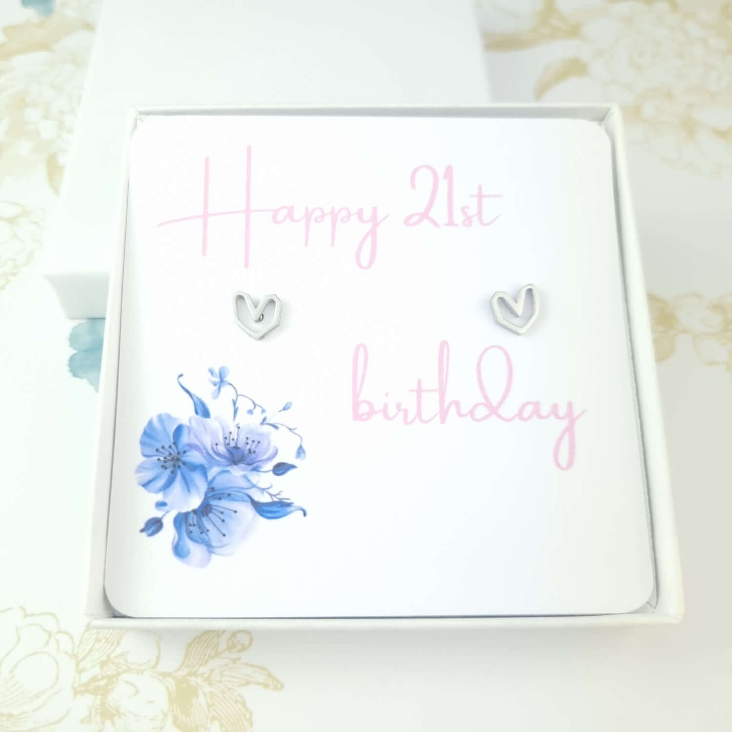 21st birthday card and heart stud earrings