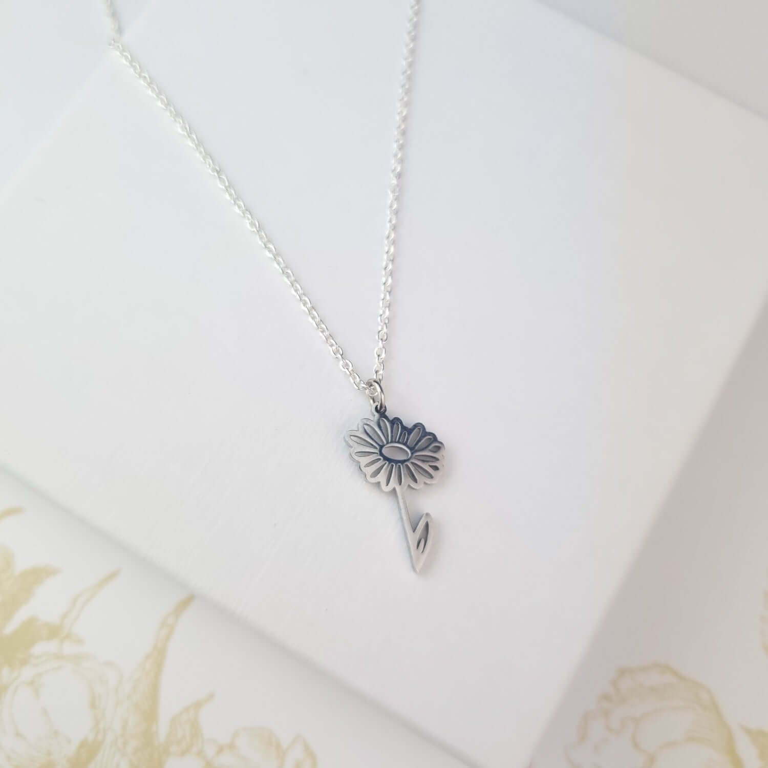 Sterling silver birth month flower necklace daisy