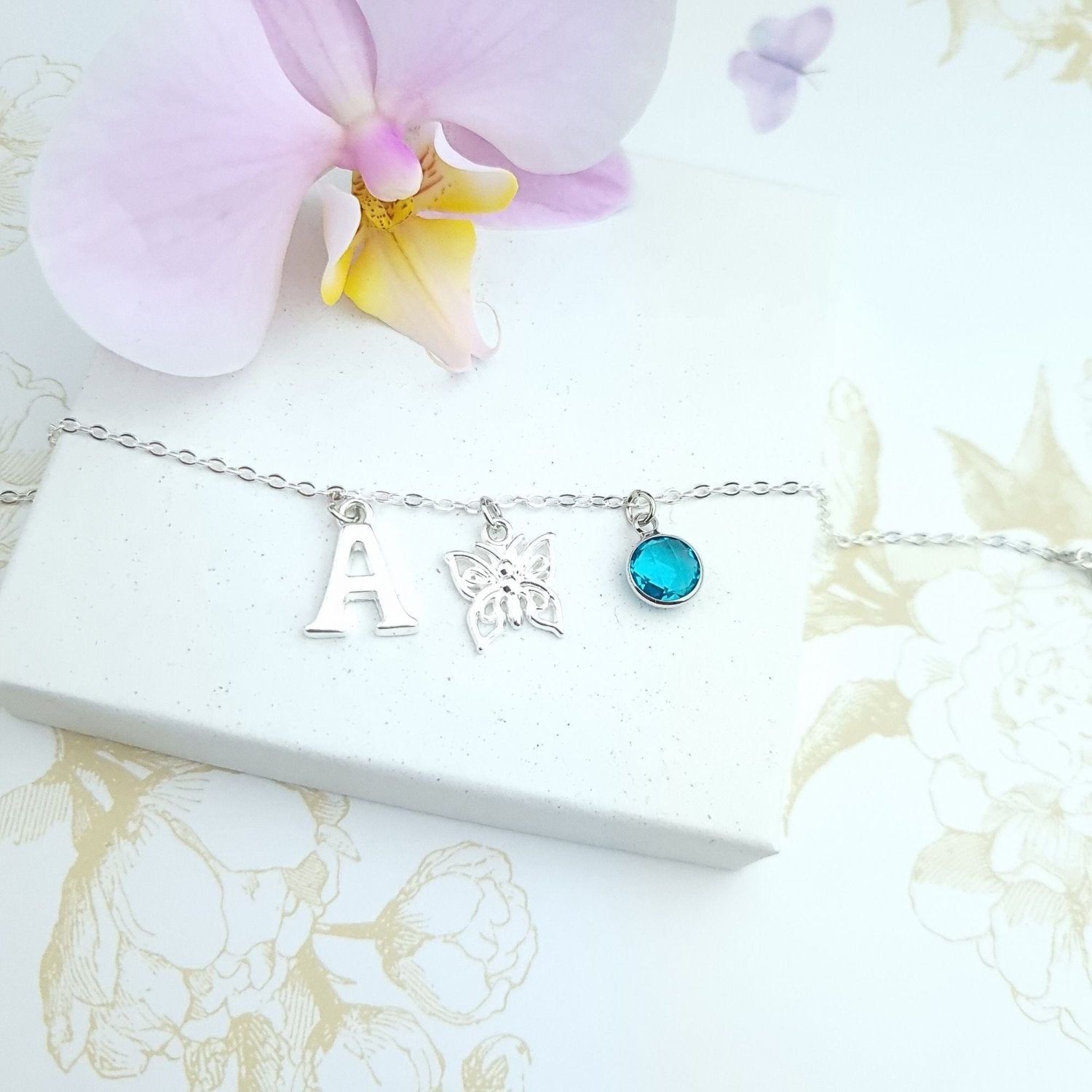 custom bracelet with butterfly charm