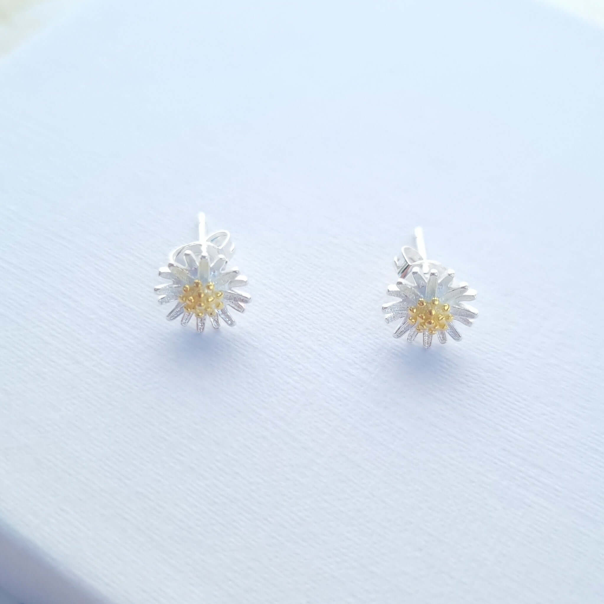 Sterling silver daisy stud earrings