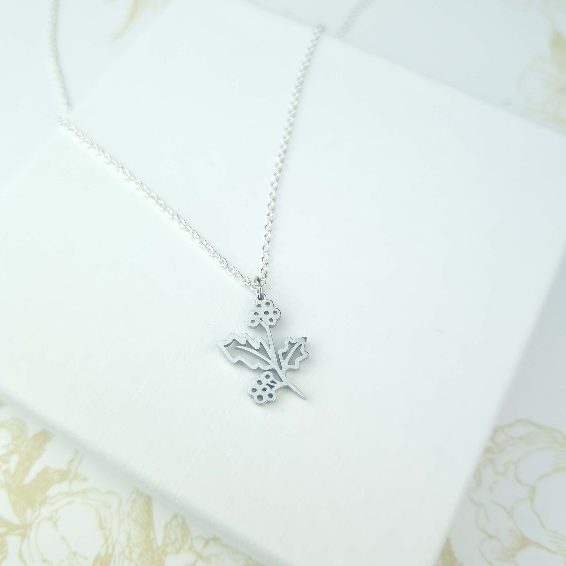 holly flower necklace in sterling silver