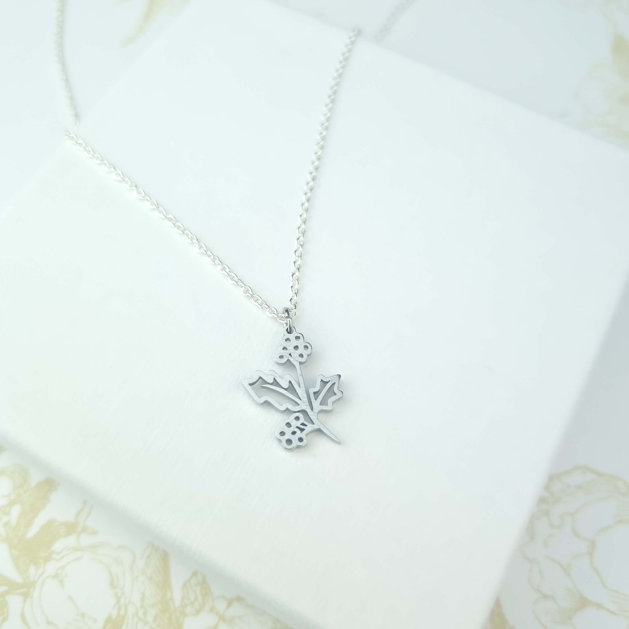 holly flower necklace in sterling silver