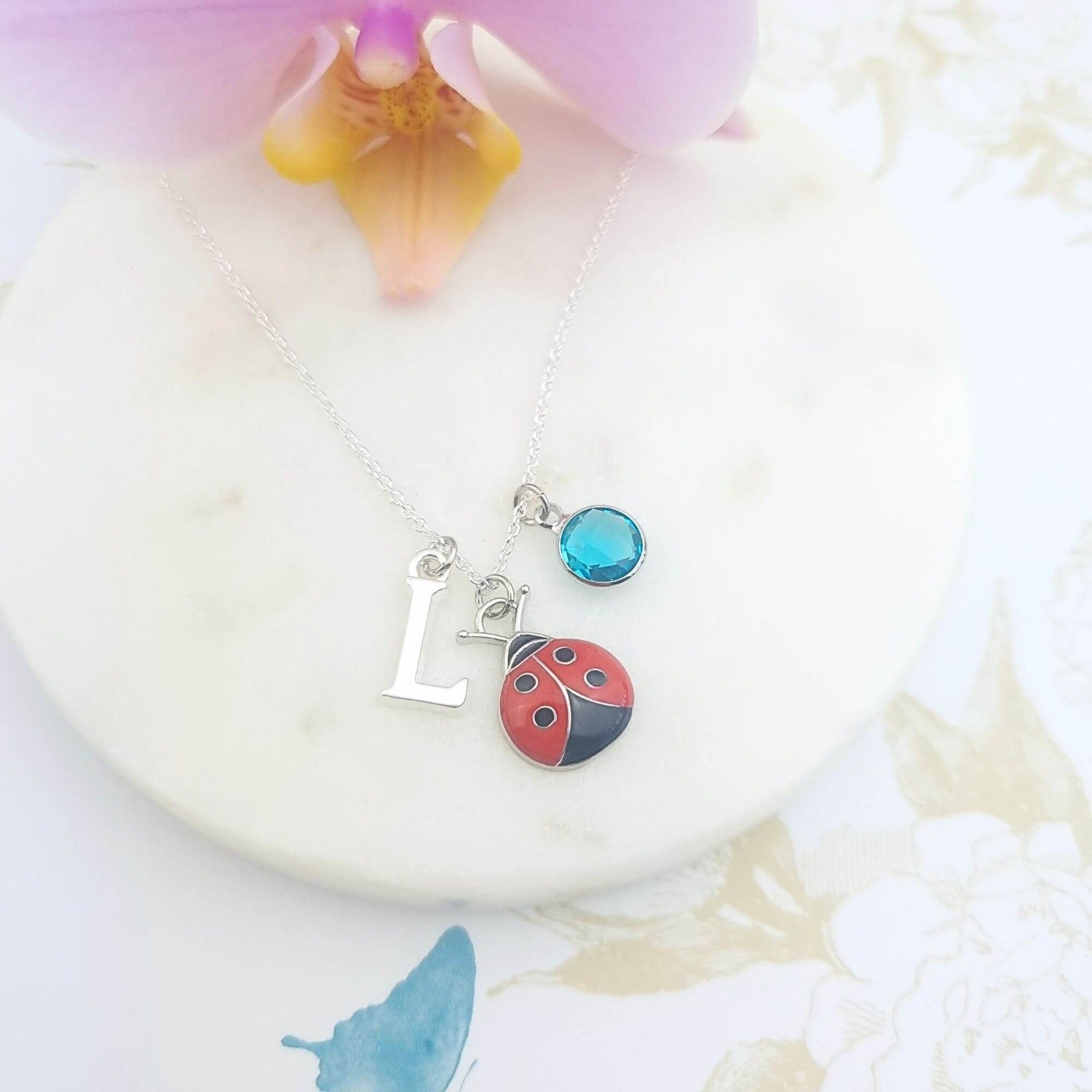 sterling silver ladybug necklace with initial and birthstone