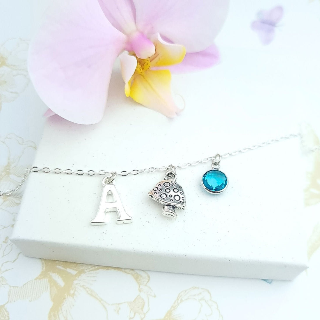 personalised mushroom bracelet with initial and birthstone