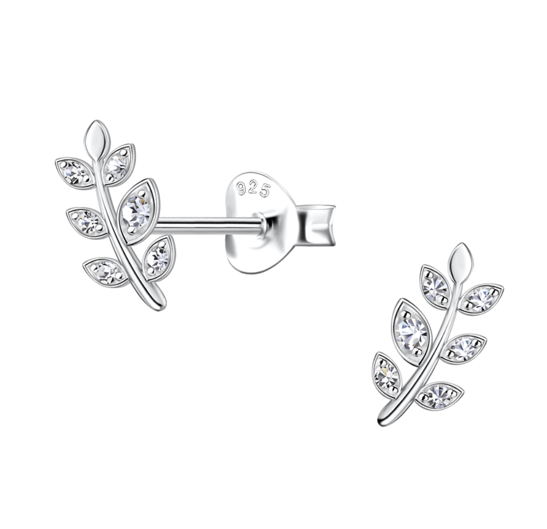 A pair of sterling silver olive leaf earrings with cubic zirconia stones, elegantly designed with a botanical-inspired look, displayed on a white background. A timeless symbol of peace and wisdom.