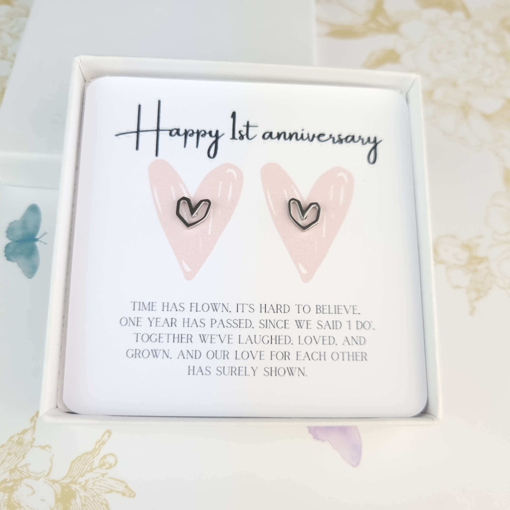 happy 1st anniversary card with poem and a pair of heart stud earrings
