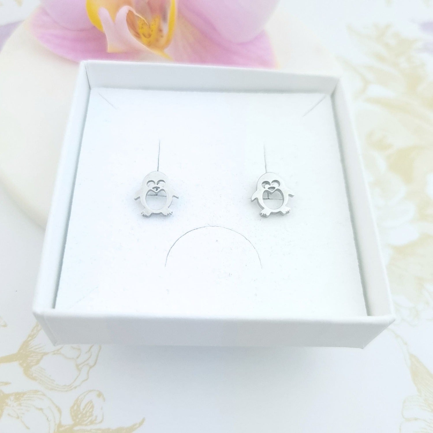 penguin stud earrings silver in gift box