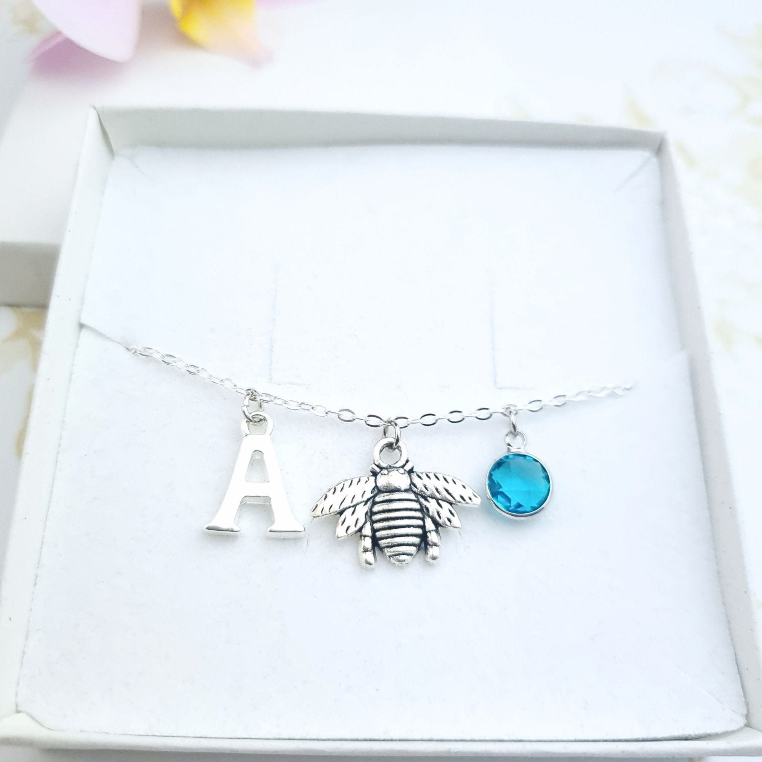 personalised bee bracelet with initial and birthstone