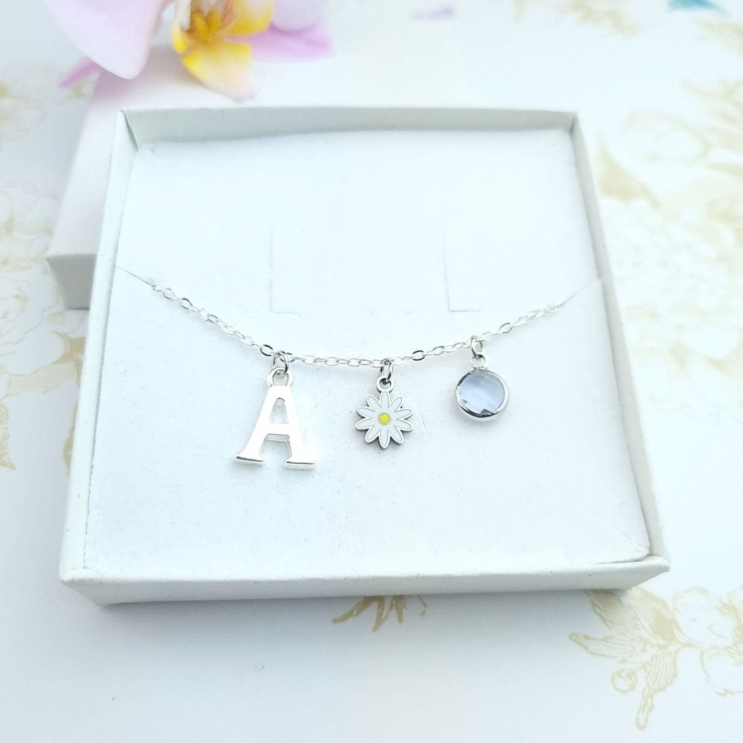 personalised daisy bracelet with initial and birthstone