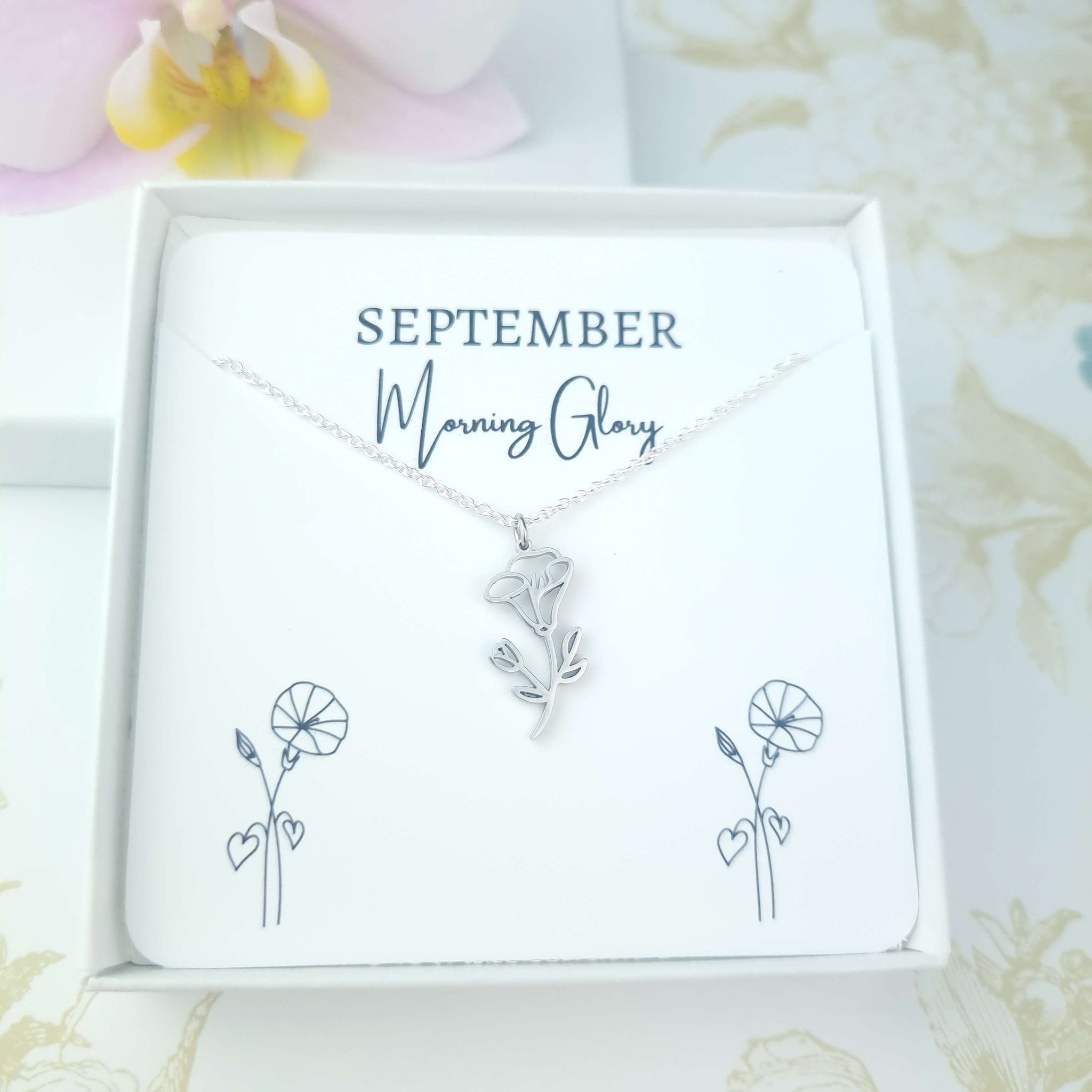 september birth flower necklace in a gift box