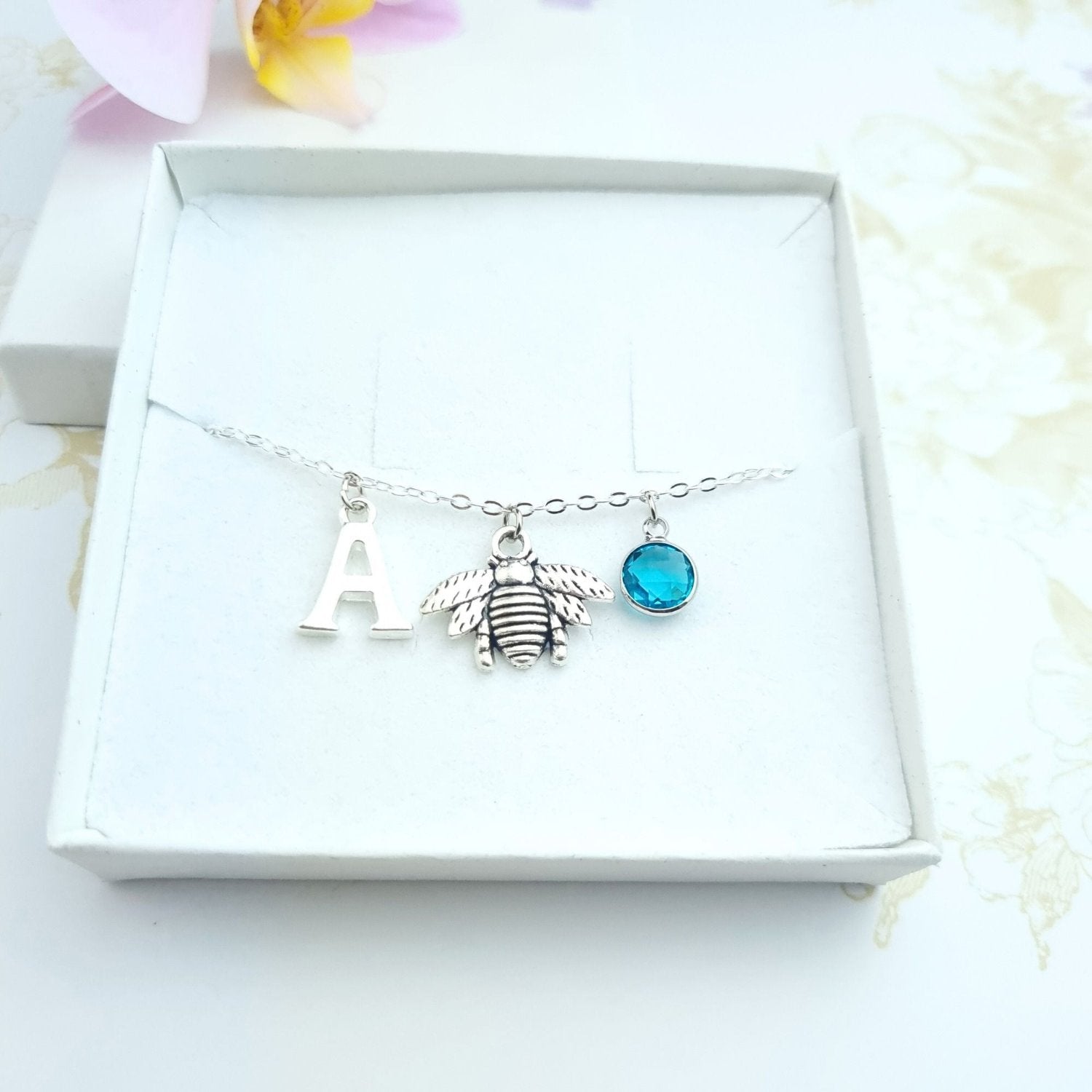 bee silver bracelet personalised with initial and birthstone