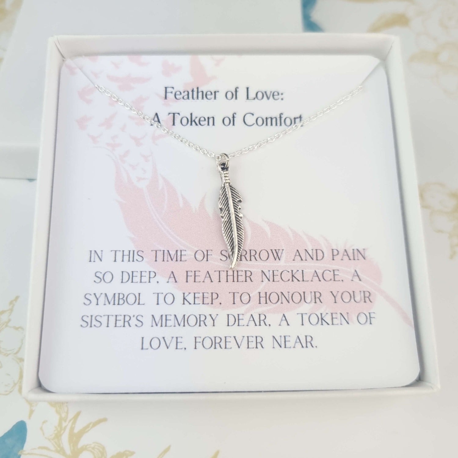 Loss of sister feather necklace