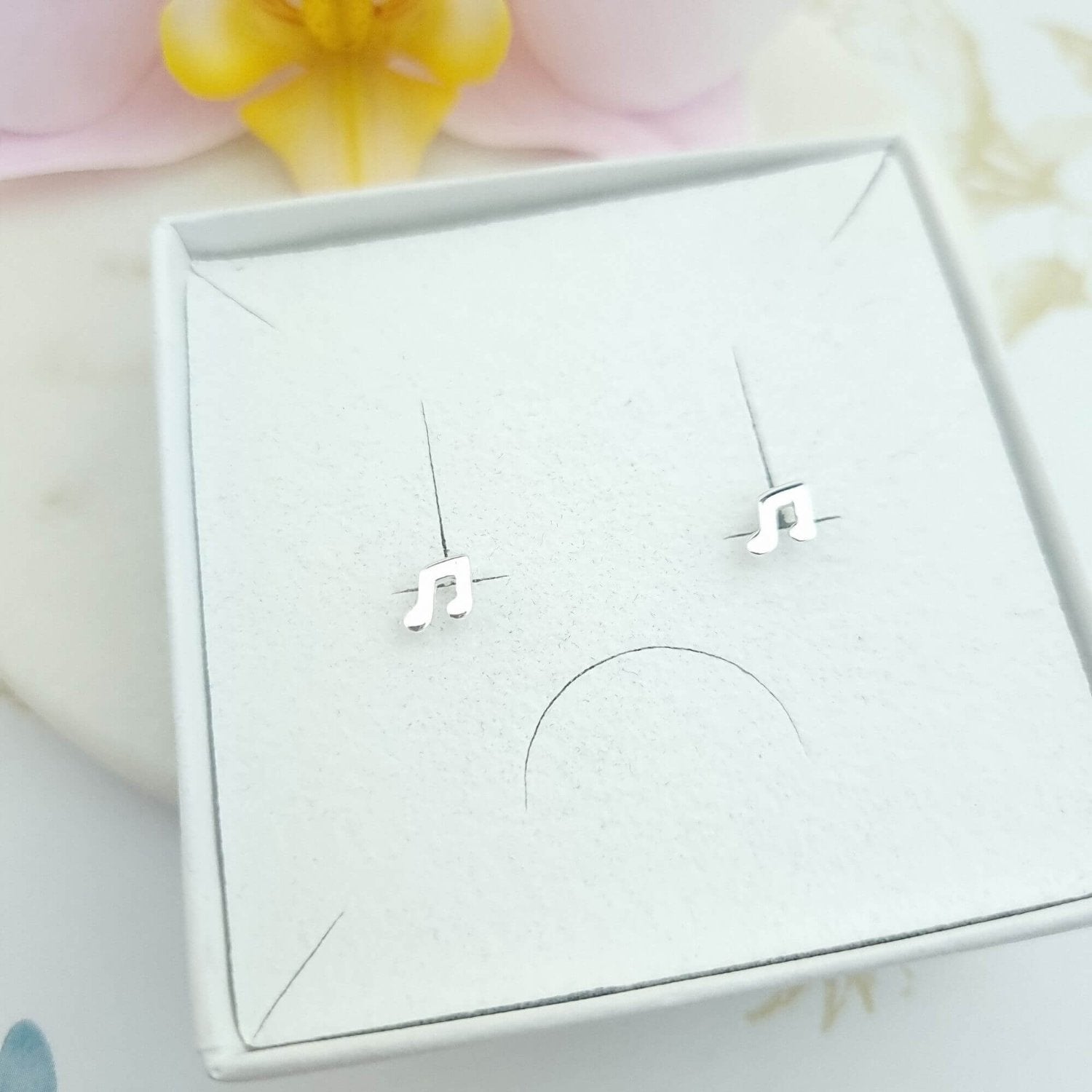 music note stud earrings in sterling silver