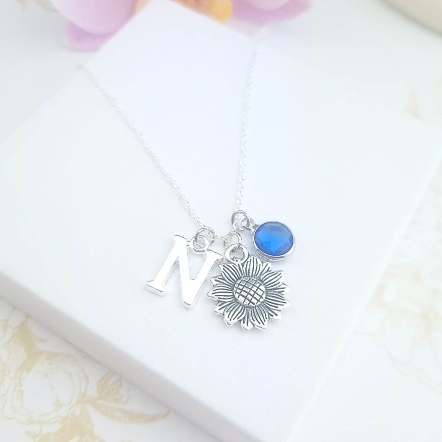 personalised sunflower necklace in sterling silver