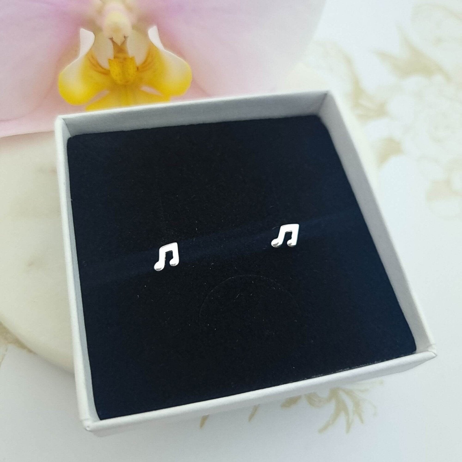 tiny music note stud earrings
