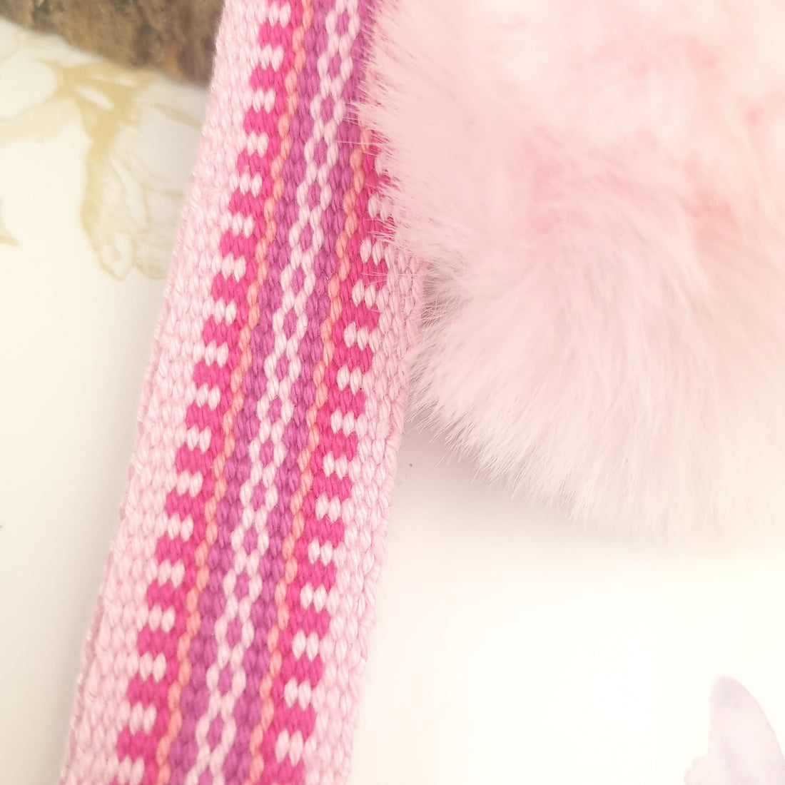 wristlet strap keychain in pink with pom pom