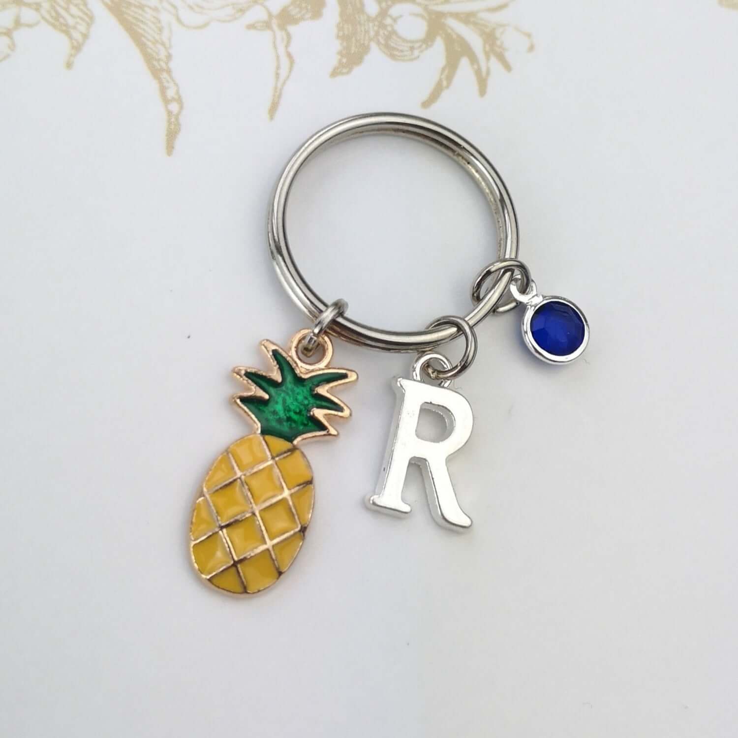 Personalised pineapple keyring with initial and birthstone
