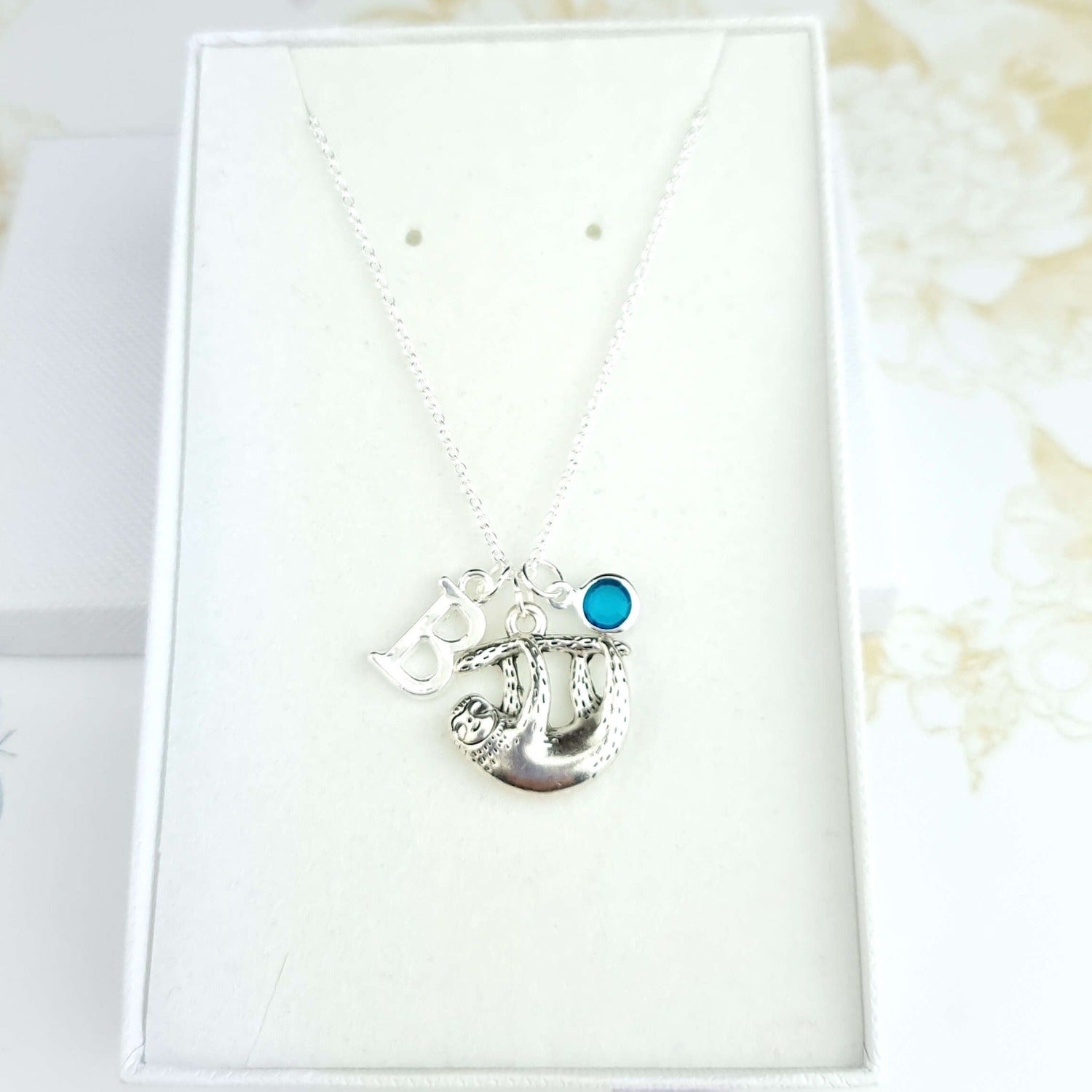 Sterling silver sloth necklace with initial and birthstone