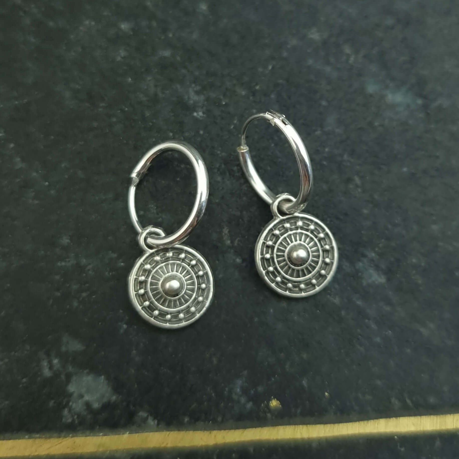 Coin shield hoops