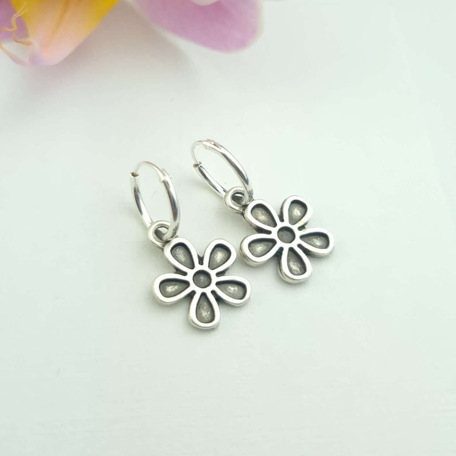 Flower huggie hoop earrings