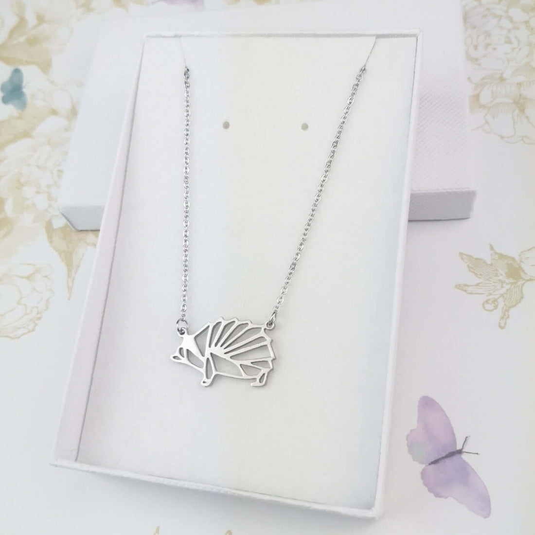 Geometric hedgehog pendant in a silver chain