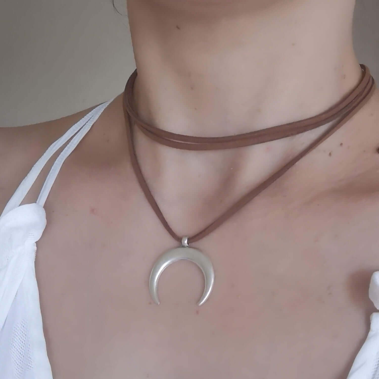 Crescent moon leather necklace