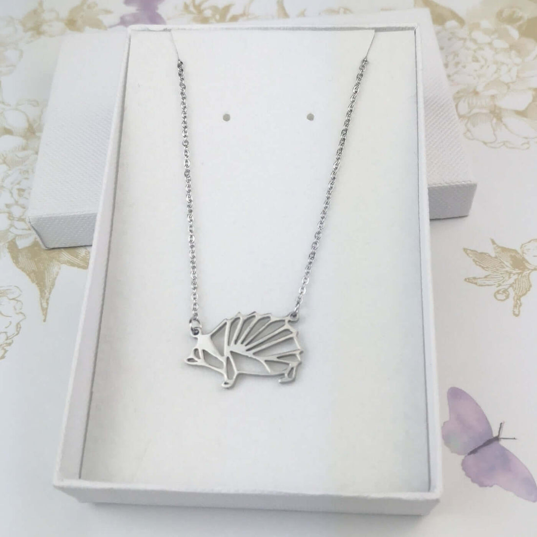 Geometric hedgehog pendant in a silver chain