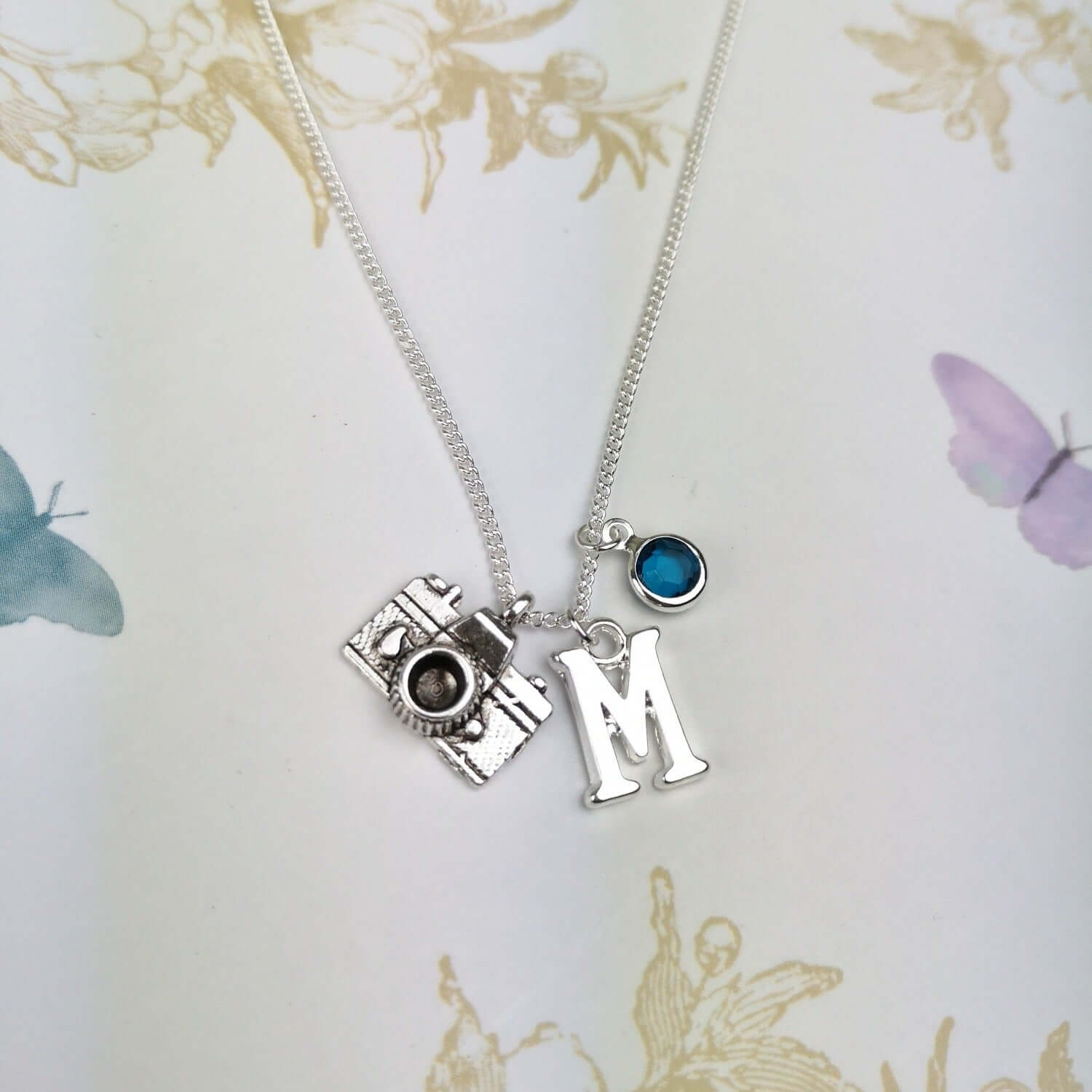 personalised silver camera necklace with initial and birthstone