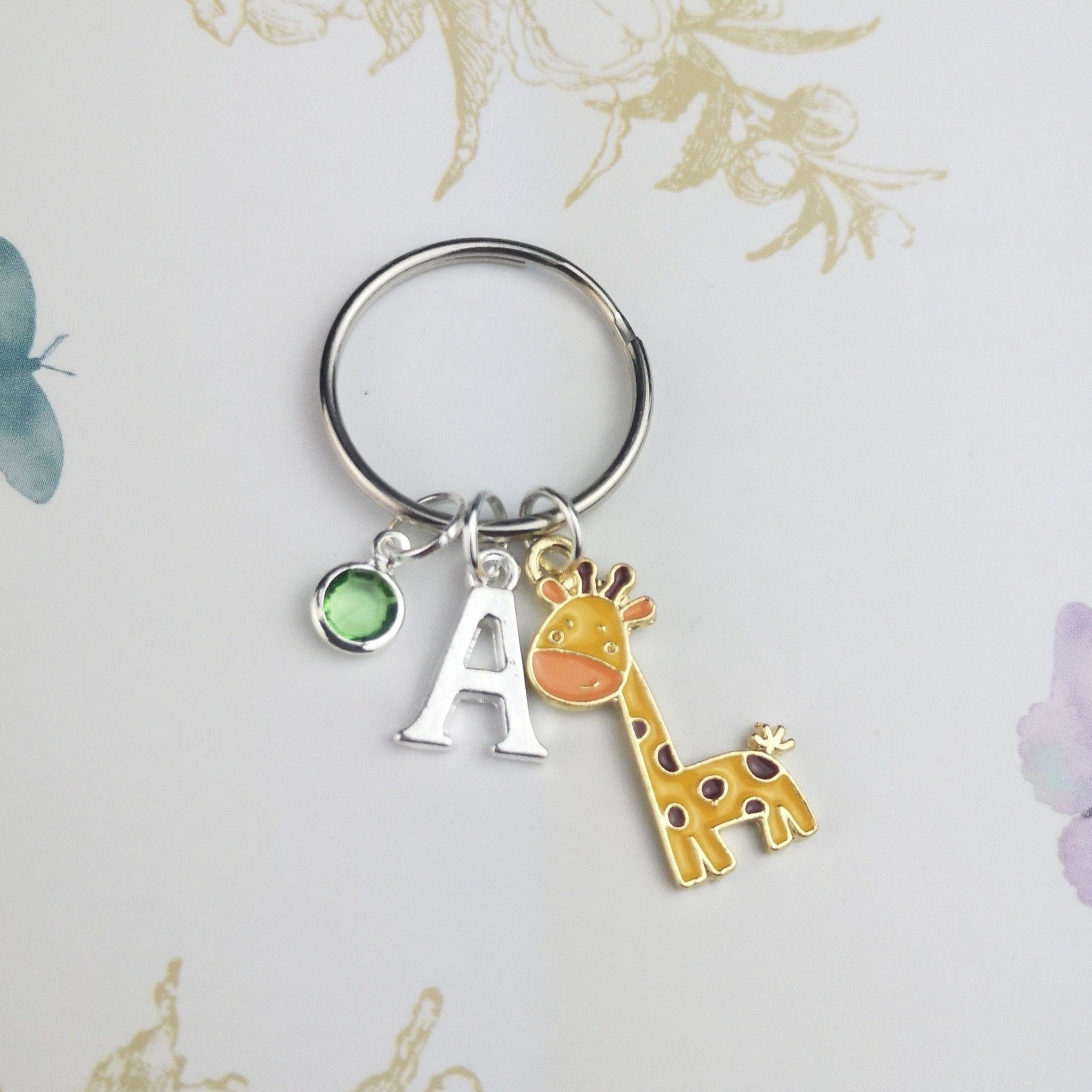 Personalised giraffe keyring with initial and birthstone