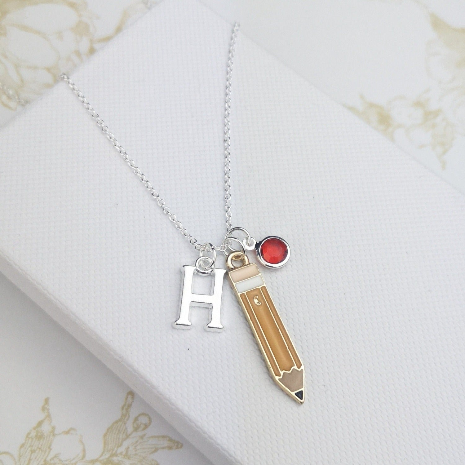 Personalised sterling silver necklace with an enamel pencil