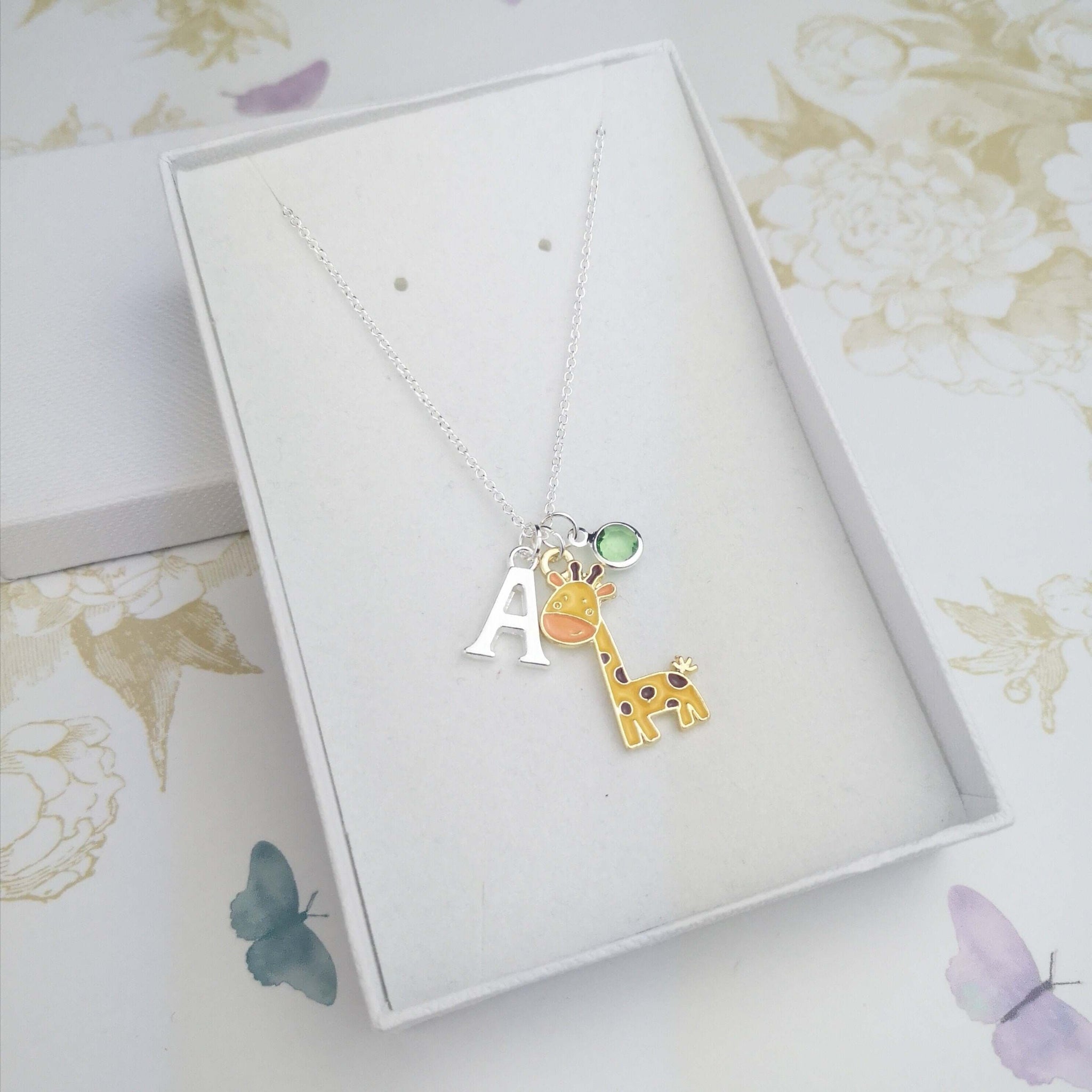 personalised giraffe necklace with initial and birthstone 