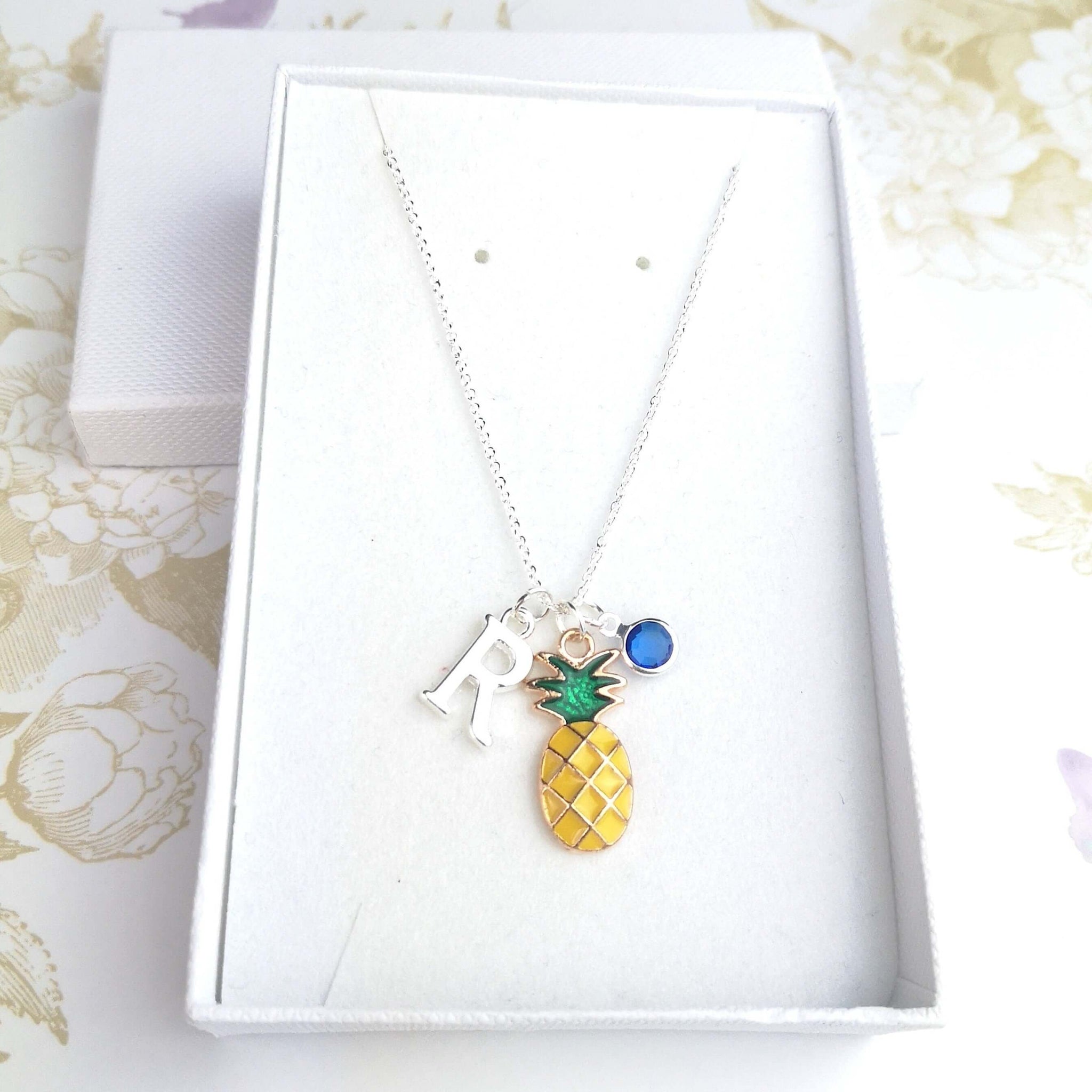 personalised pineapple necklace with initial and birthstone