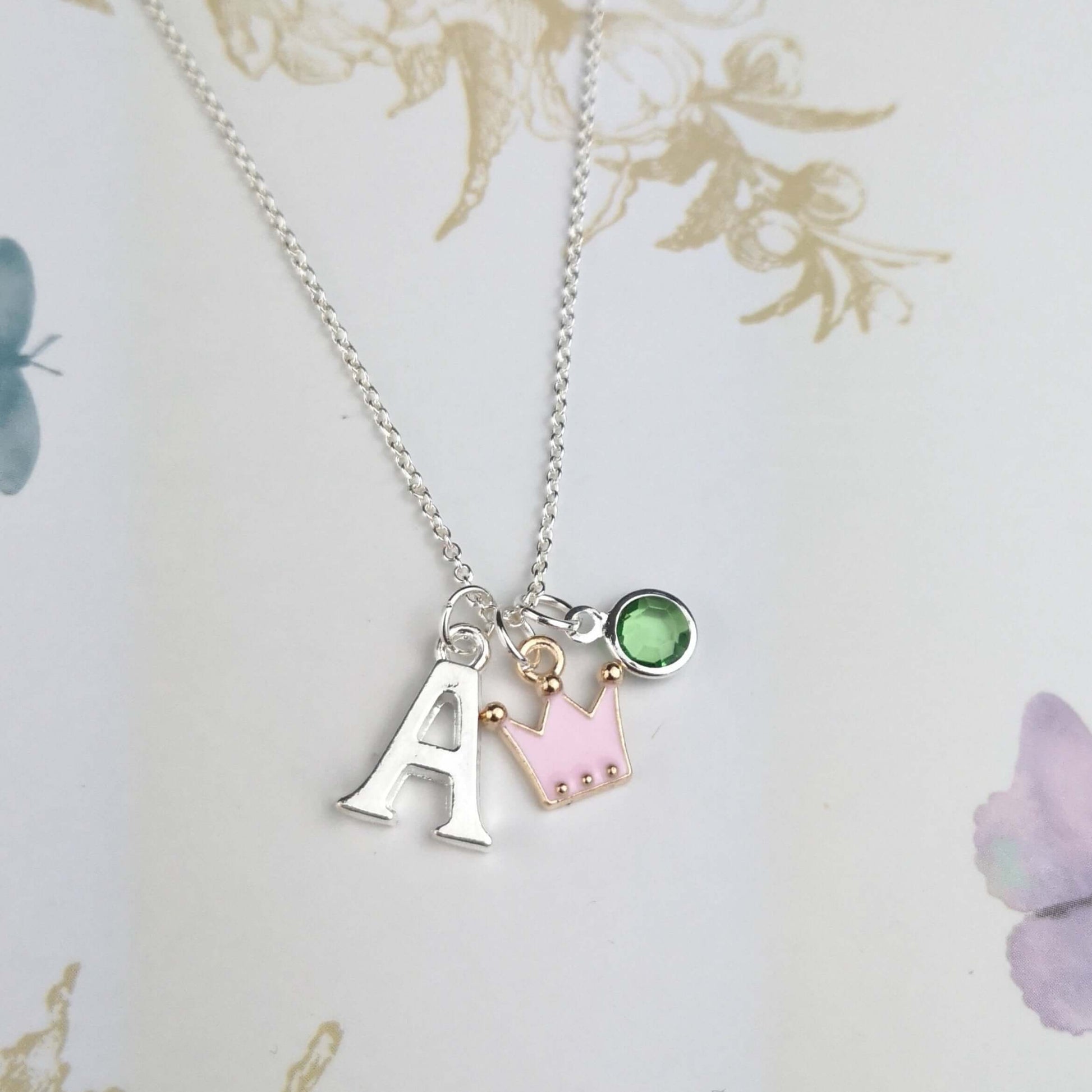 personalised pink crown necklace with initial and birthstone