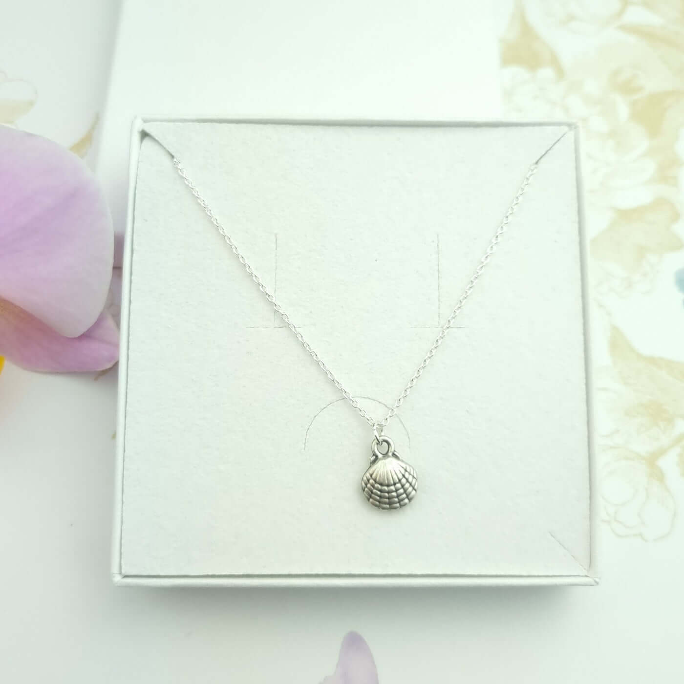 Sterling Silver chain with a seashell pendant
