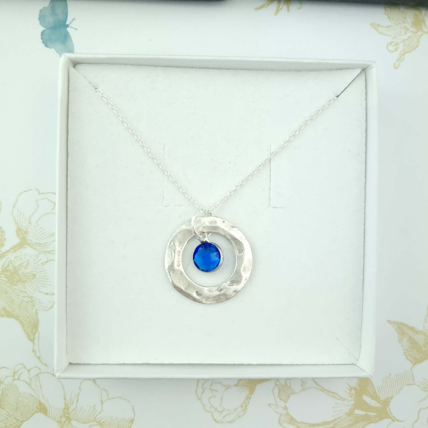 Blue stone September silver necklace in a gift box