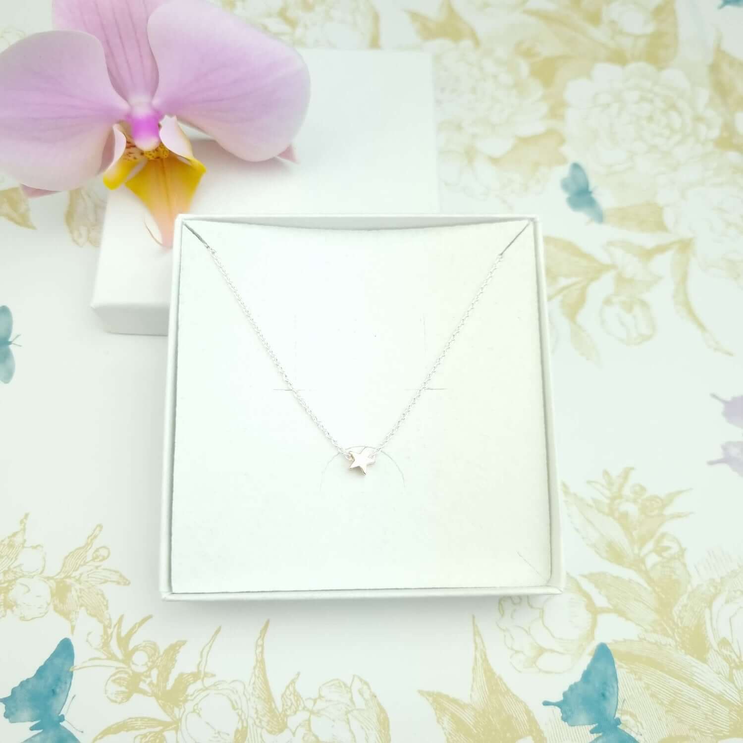 Small star in a sterling silver chain
